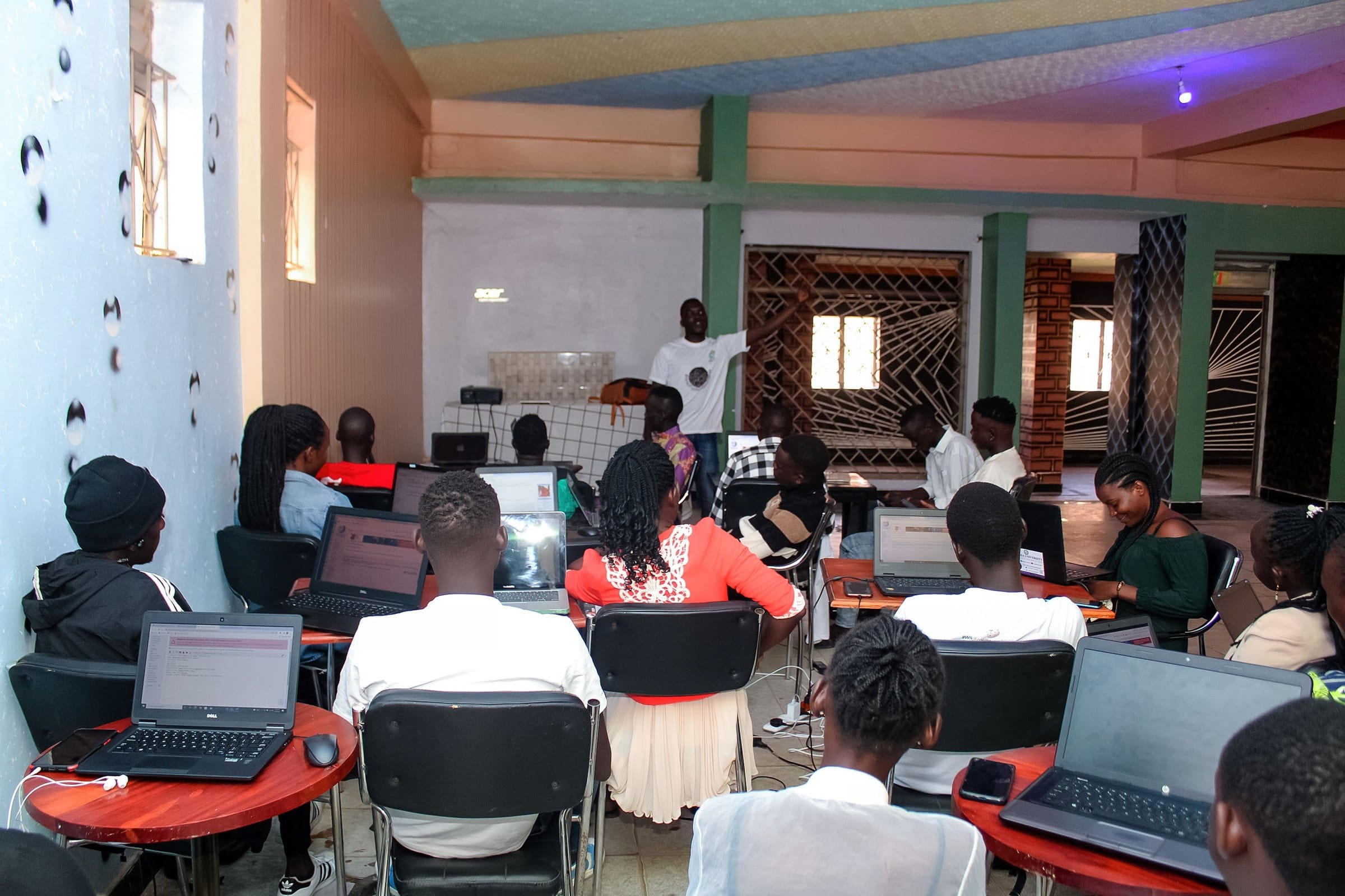 Participants listen to a trainer during a workshop