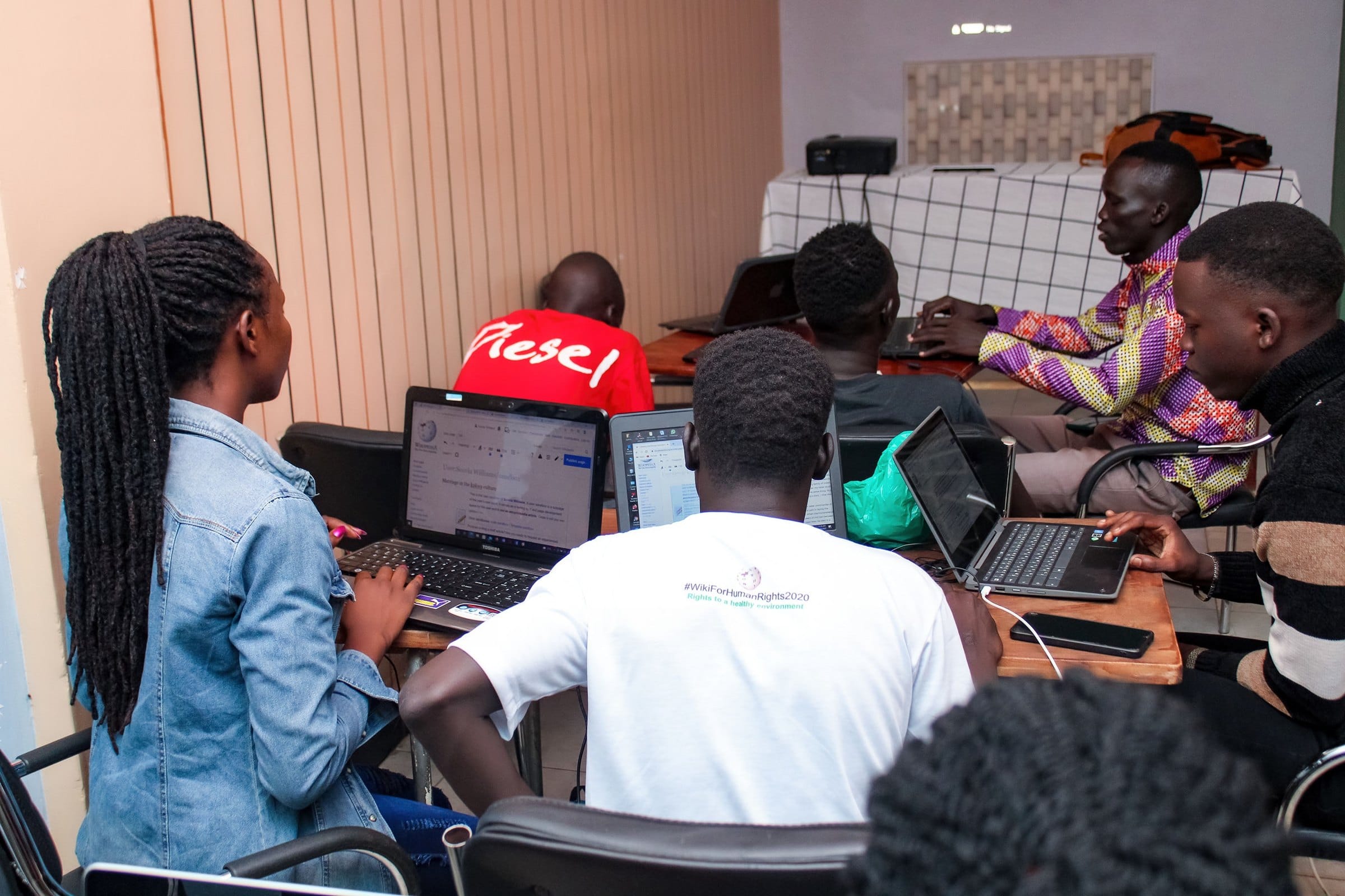Participants in a group discussion during a human rights training
