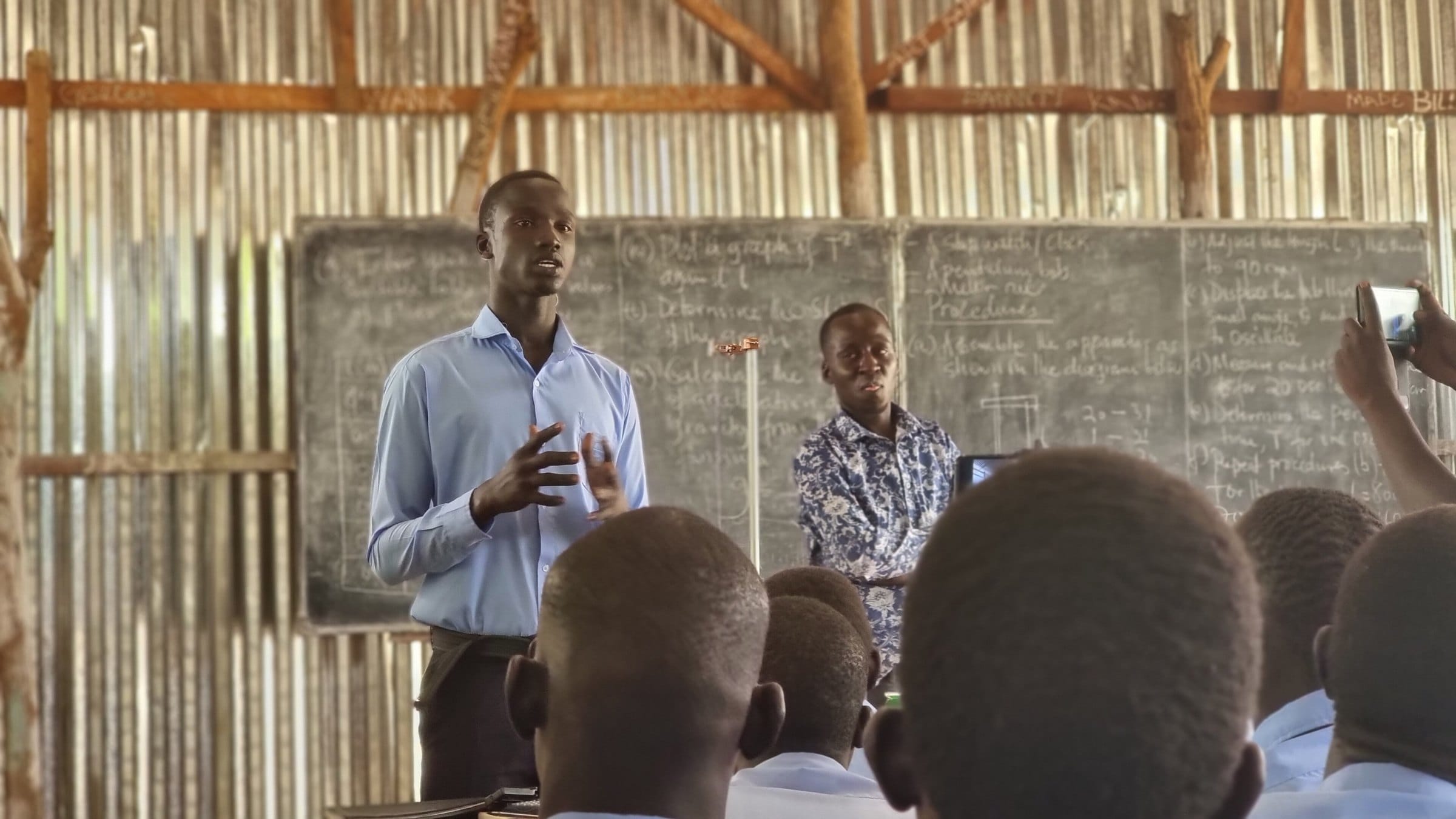 A teacher leads a lesson in a classroom in Bor