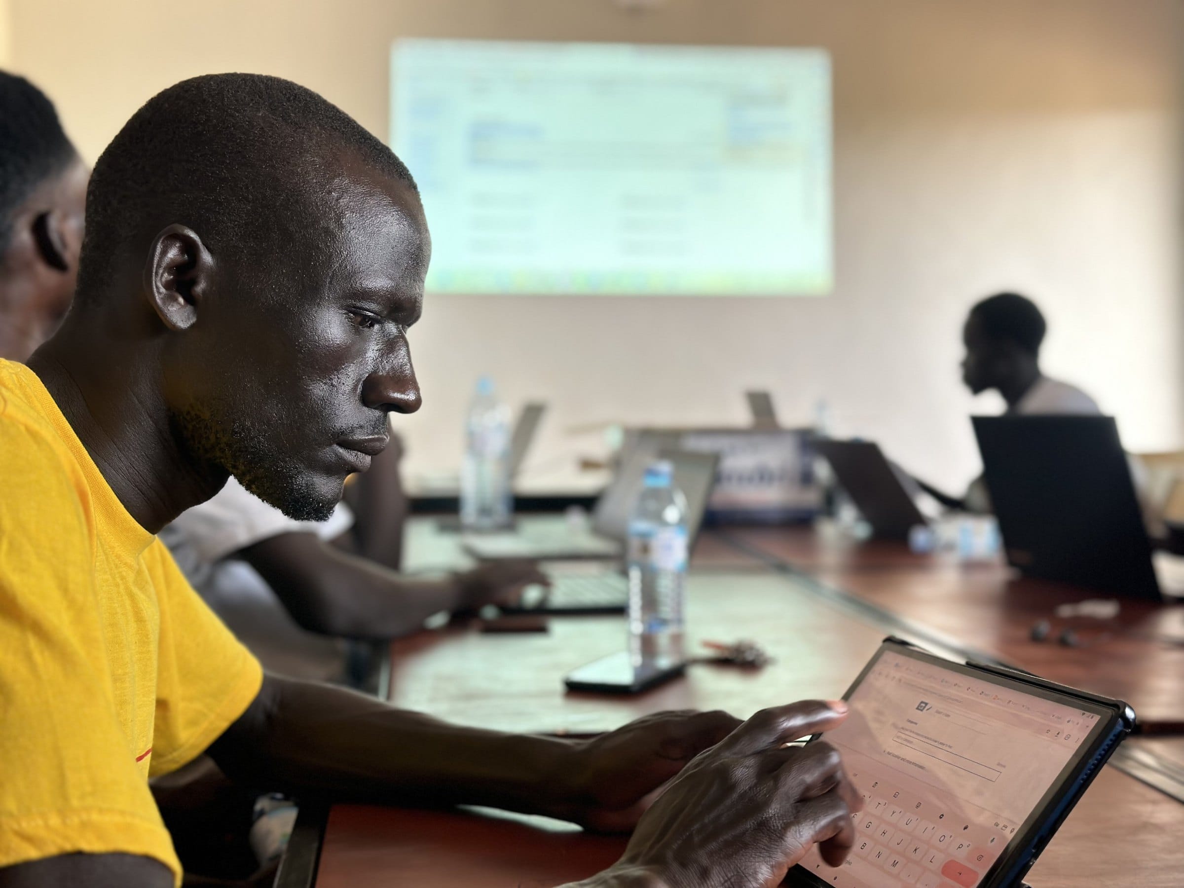A participant concentrates during a documentation training